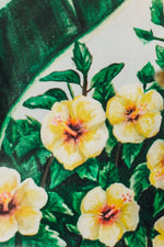 vibrant floral and green wallpaper