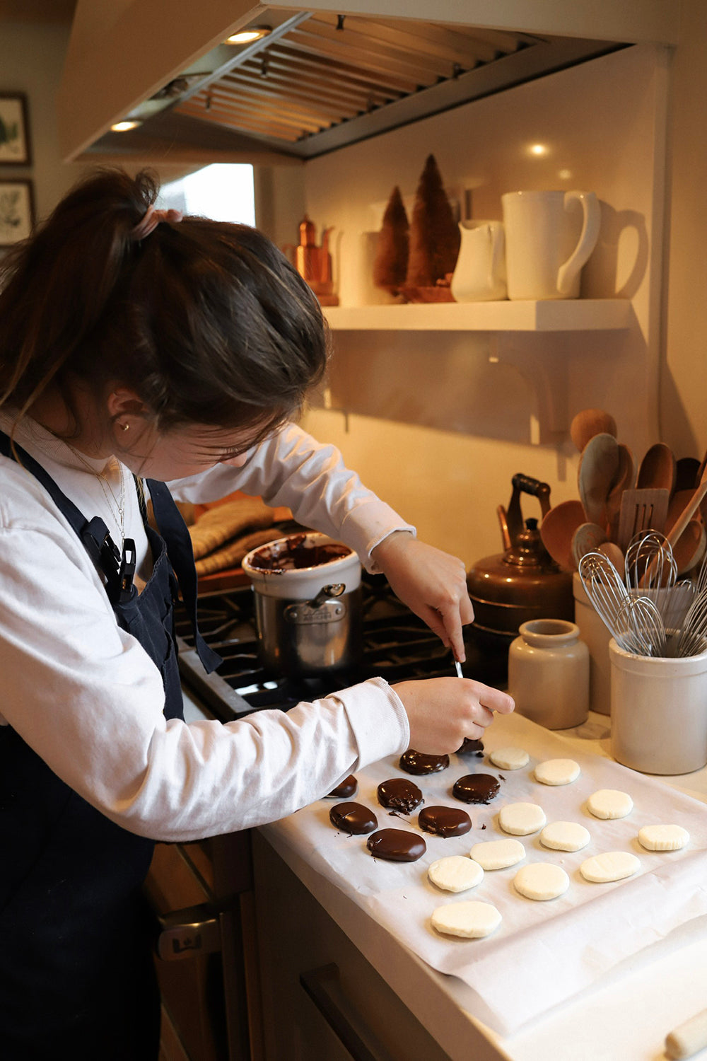 Richele baking in kitchen